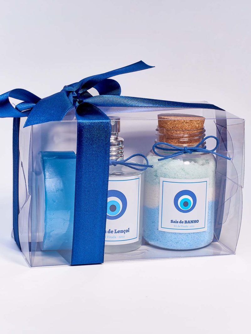 Kit da virada na embalagem de acetato com fita, com sais de banho, sabonete olho grego e água de lençol