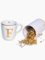 Caneca personalizada com aplicação de ouro e lata com chá